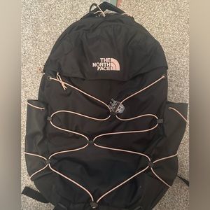 The NorthFace borealis backpack black with pink accents